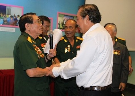 Phó Thủ tướng Thường trực Trương Hòa Bình dự buổi họp mặt chiến sĩ cách mạng từng bị địch bắt tù đày - ảnh 1